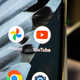 A photo of the YouTube logo on an Android home screen
